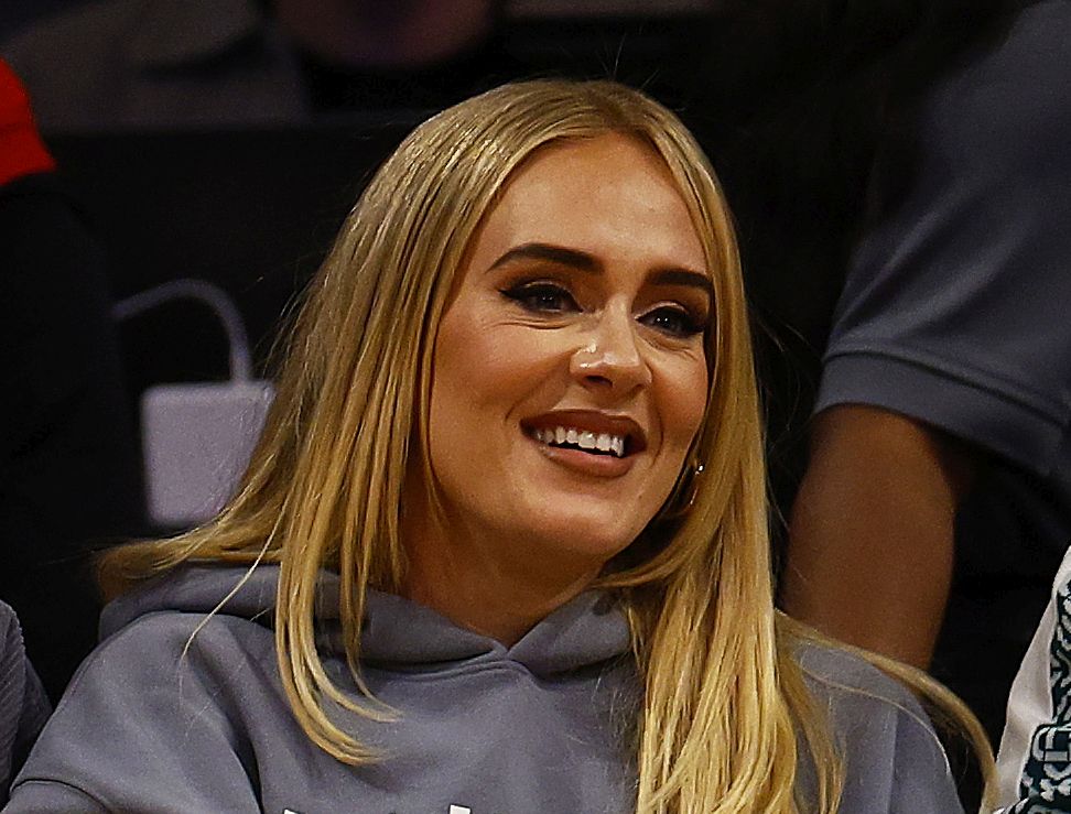 trener pevačice adel